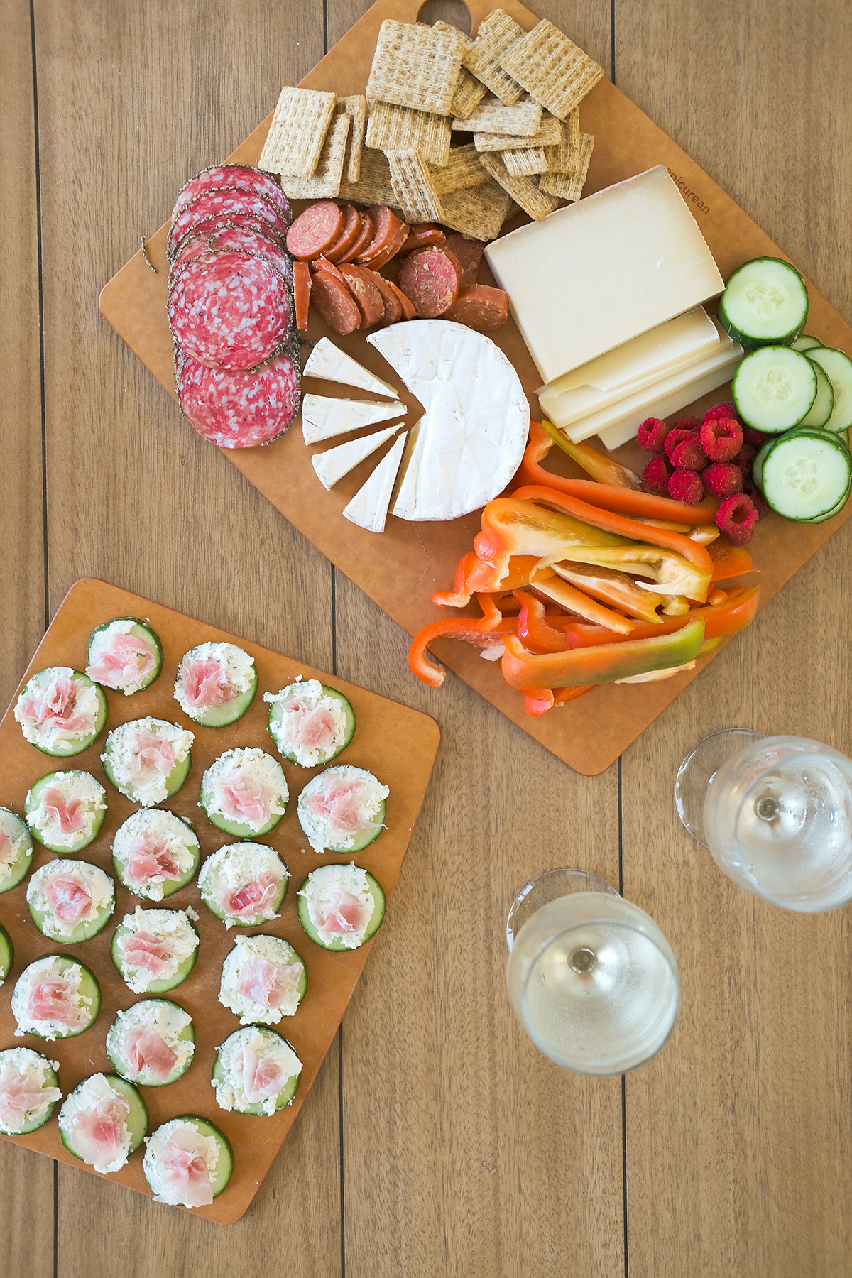 prosciutto cucumber bites with a cheese board