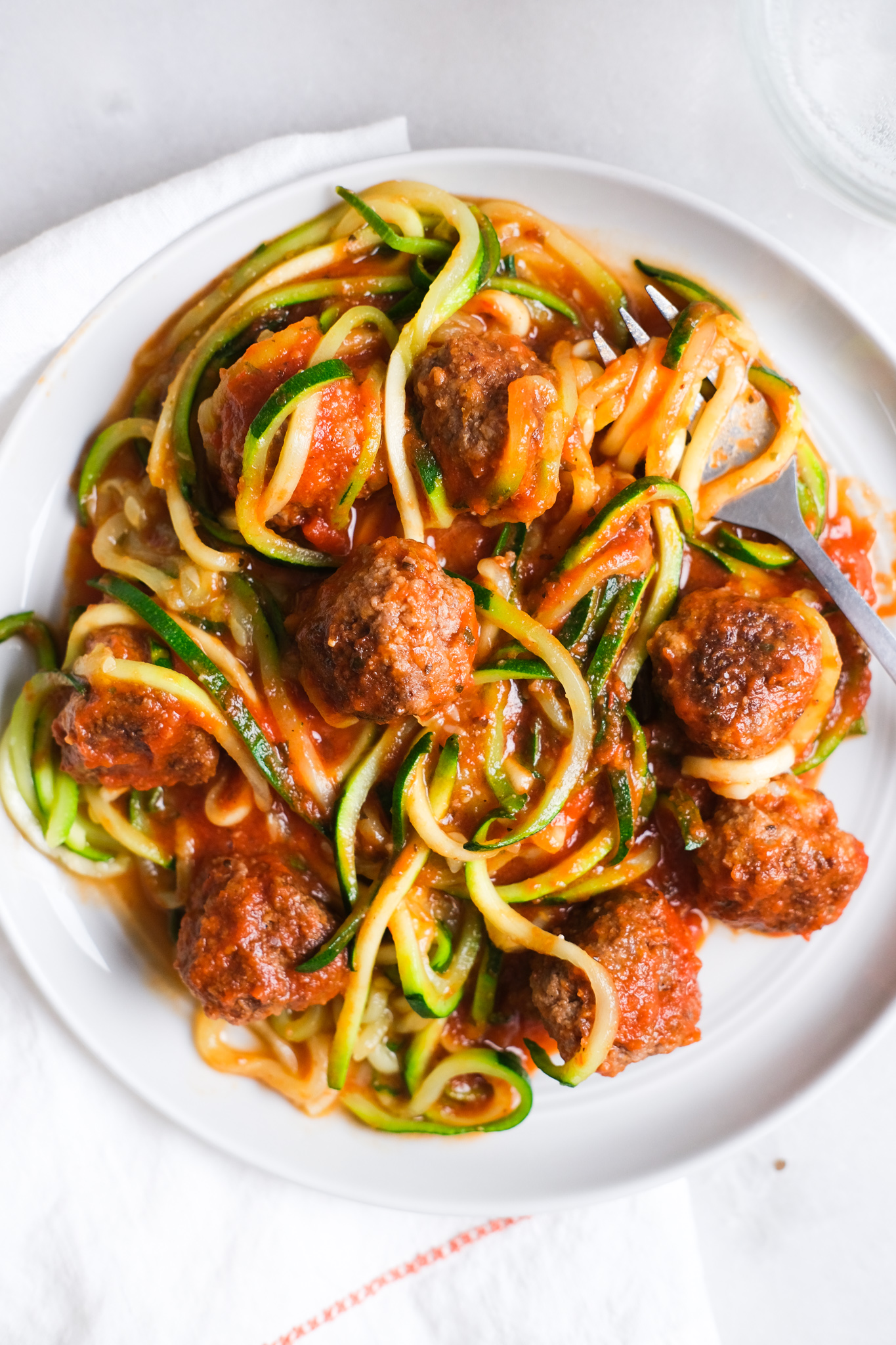 bowl of zoodles with meatballs and red sauce