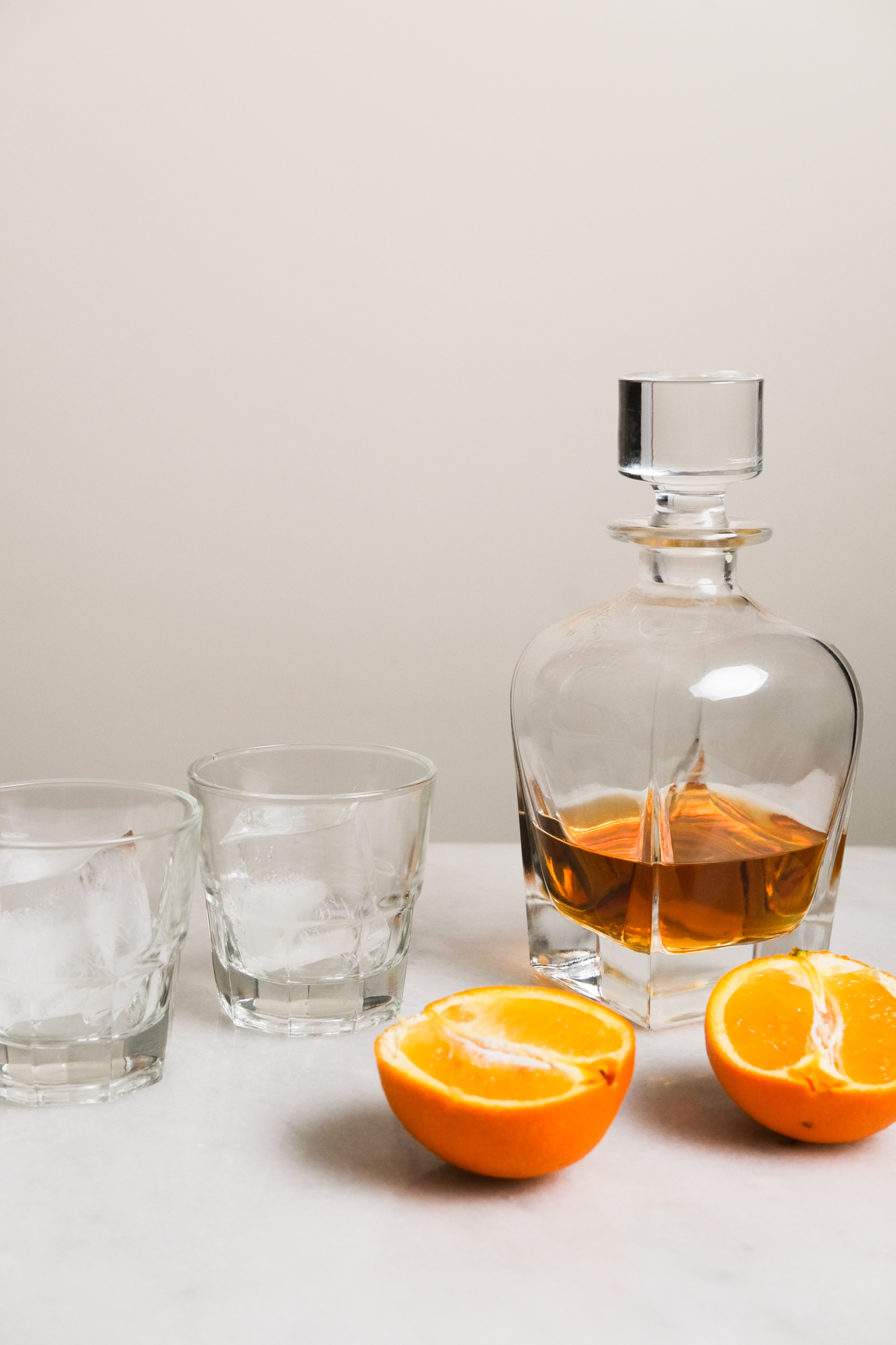 setting up to make an orange whiskey sours