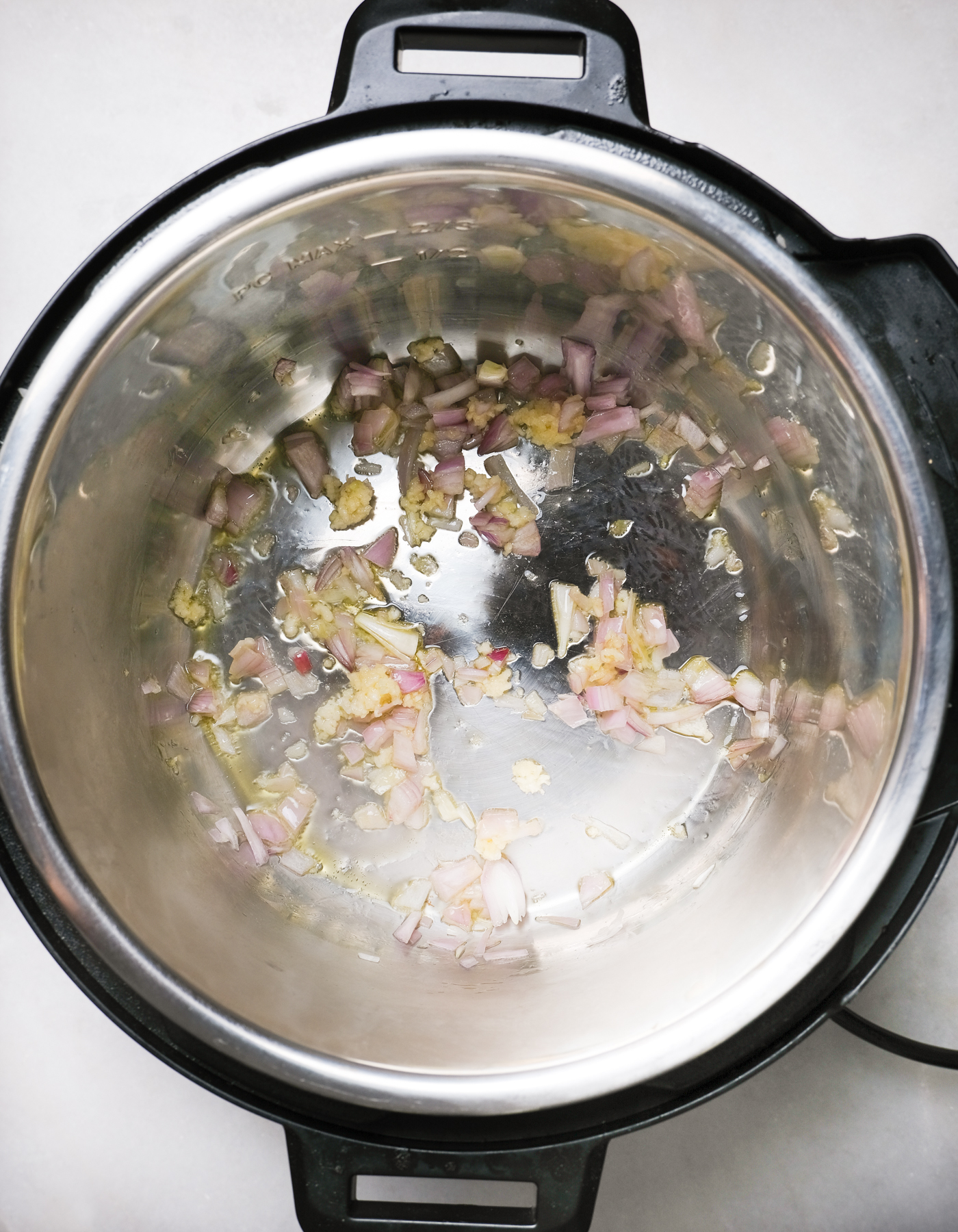 sauteeing shallots and garlic in the instant pot