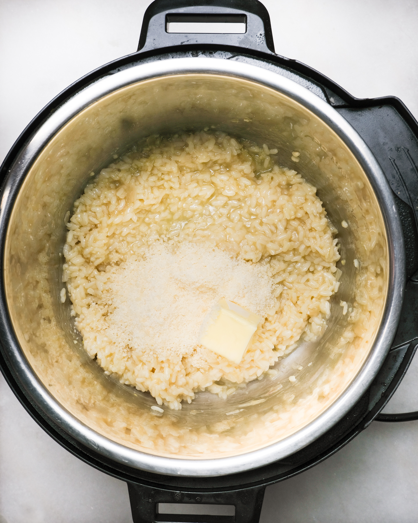 mixing parmesan and butter in instant pot for risotto
