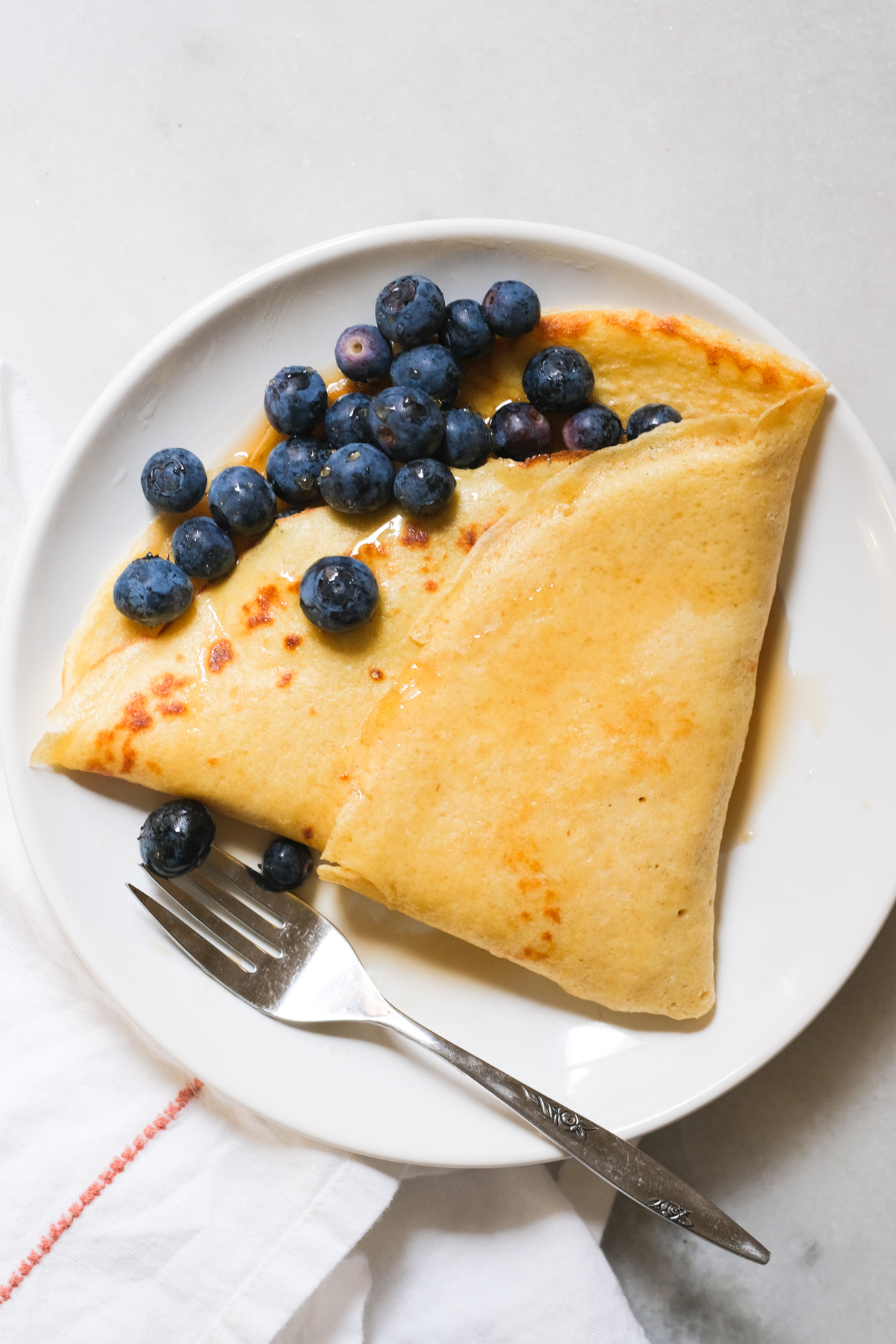 sourdough crepe with blueberries and syrup