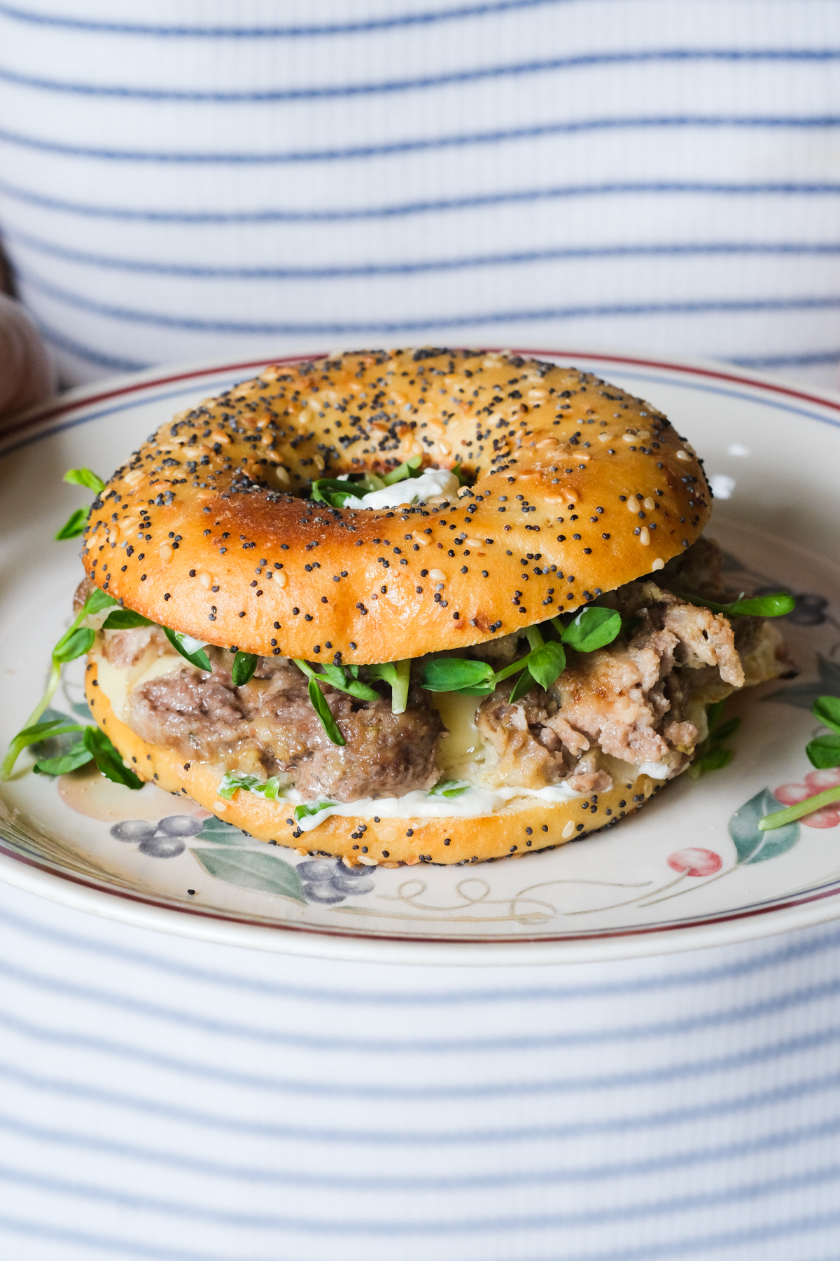 meatloaf bagel sandwich with pea shoots cheese
