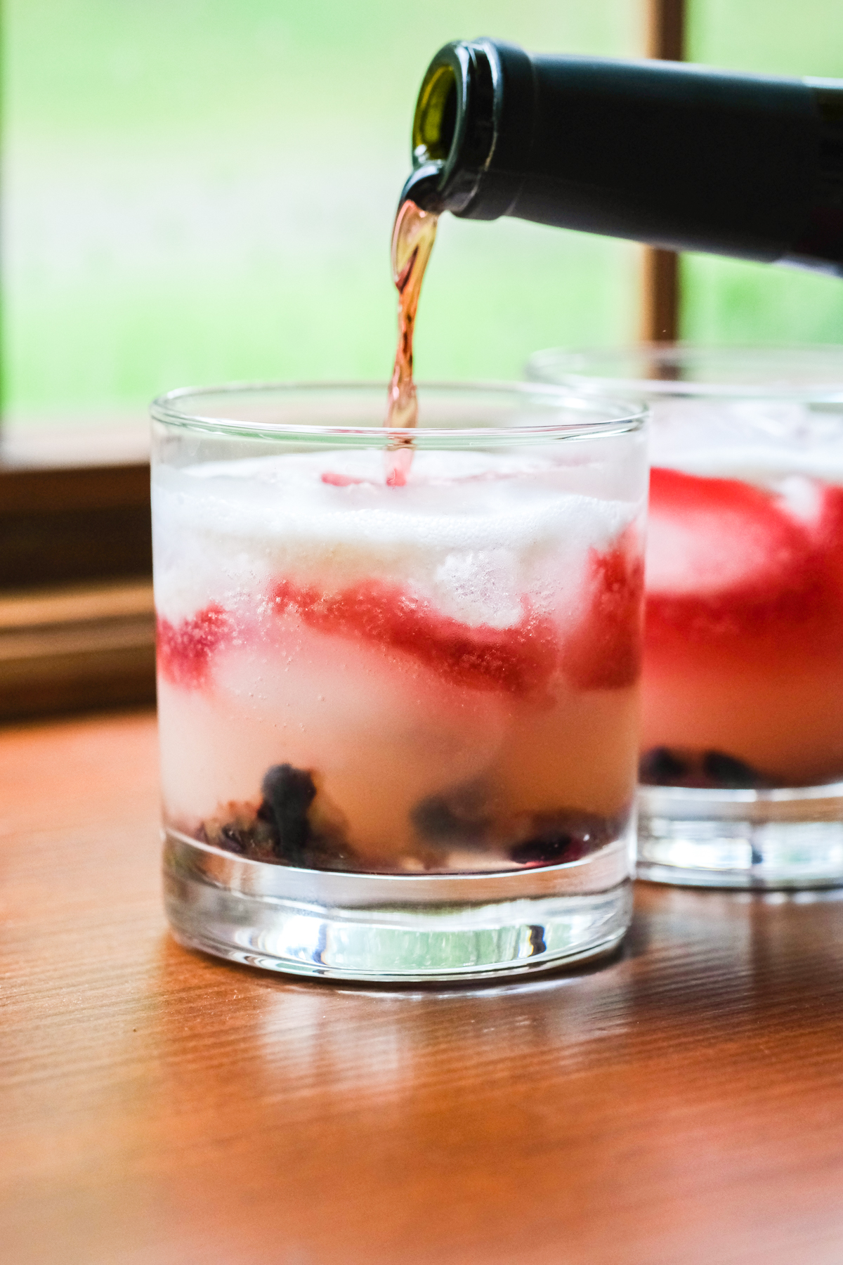 floating red wine in an old glory cocktail