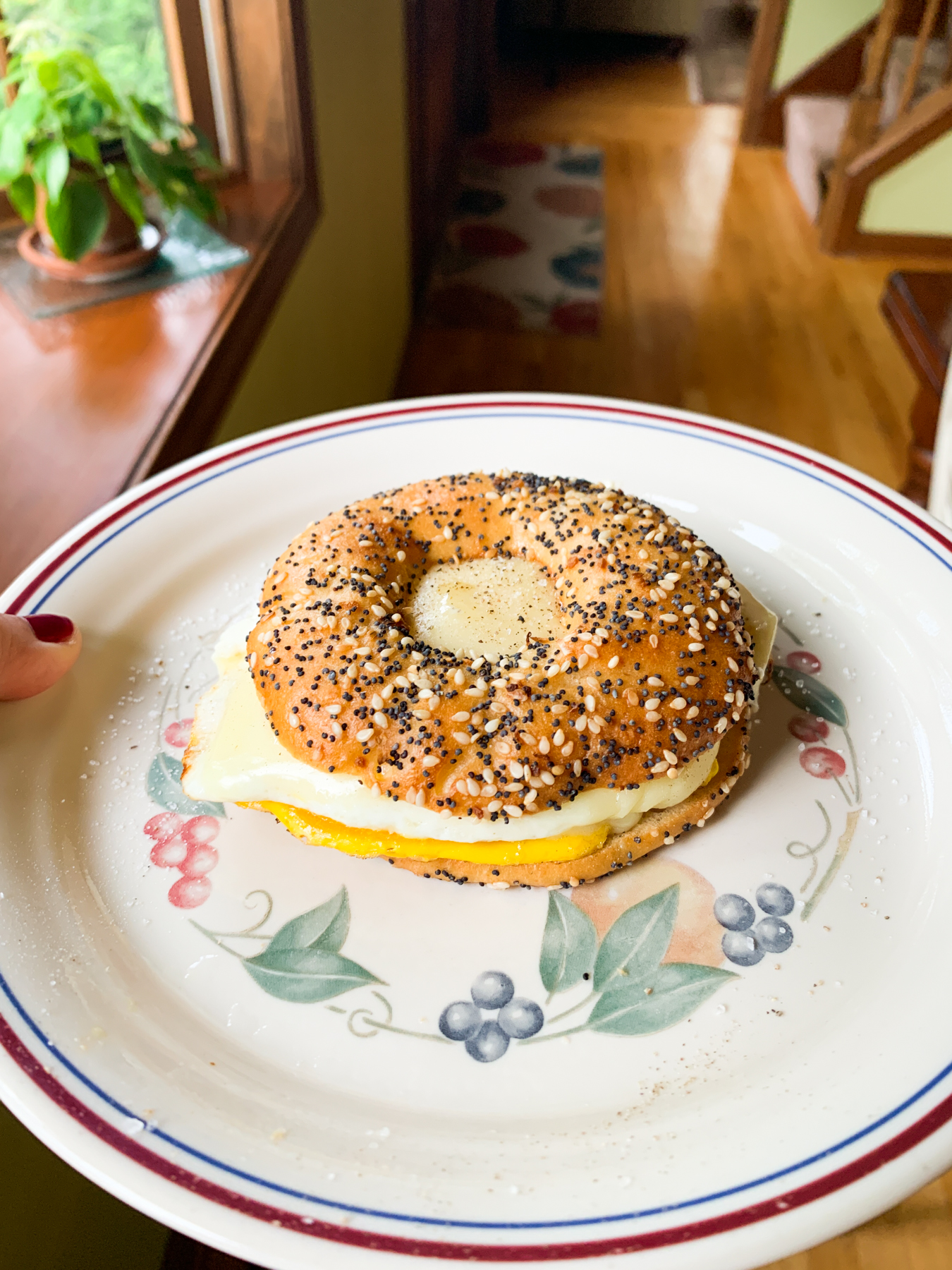 fried egg and cheese on a bagel thin