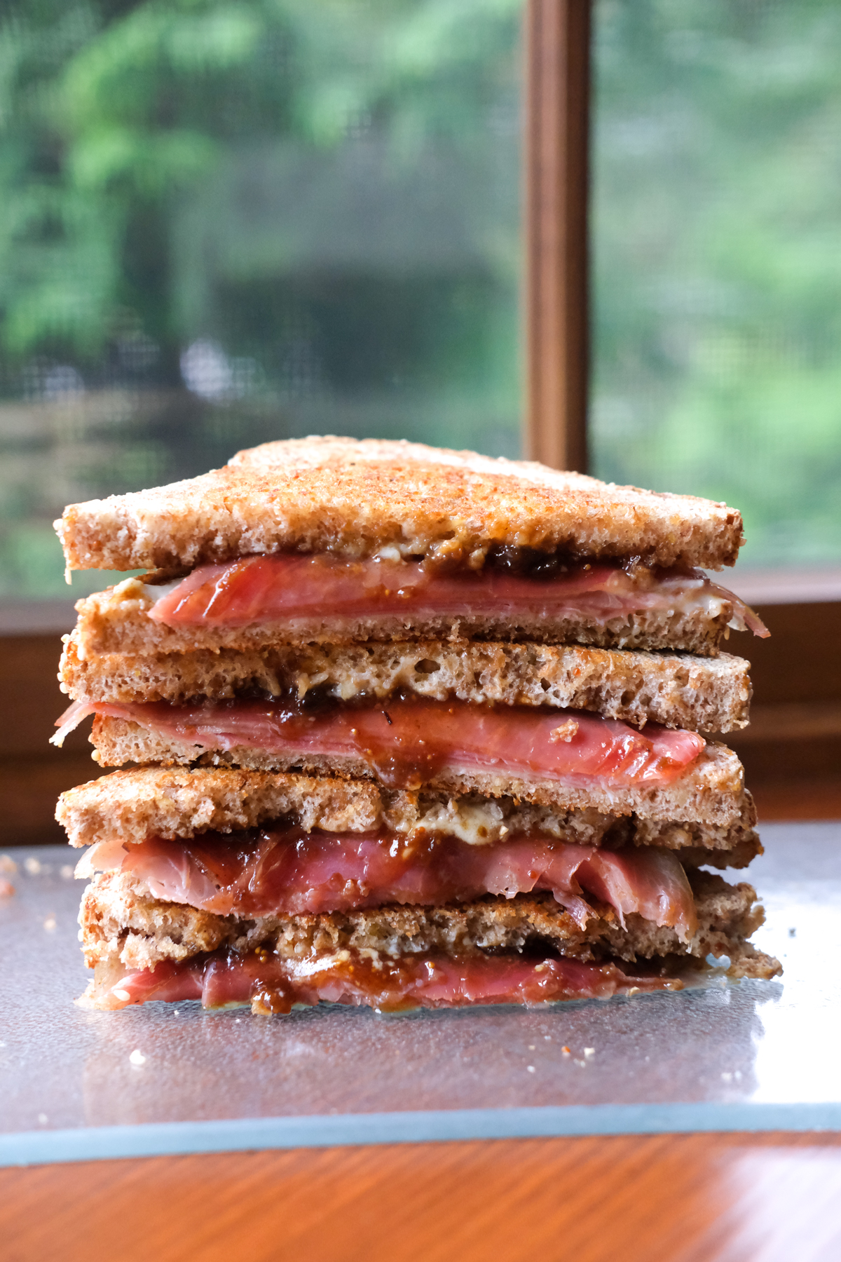 prosciutto fig grilled cheese on a plate