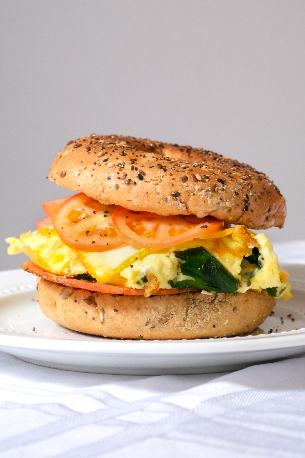 https://www.kierstenhickman.com/wp-content/uploads/2020/09/spinach-omelette-breakfast-sandwich-1-kiersten-hickman.jpg