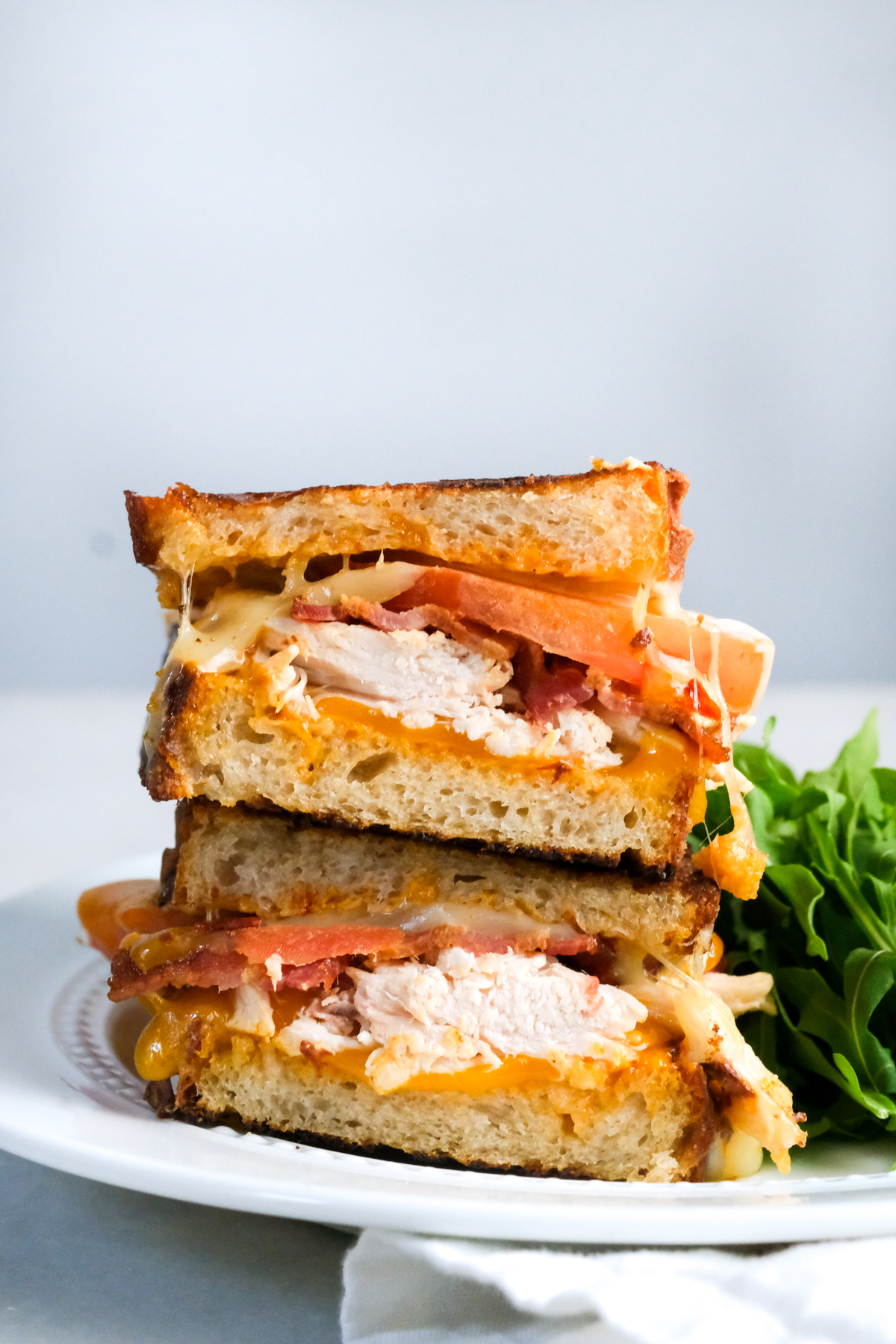 chipotle chicken bacon toastie with salad
