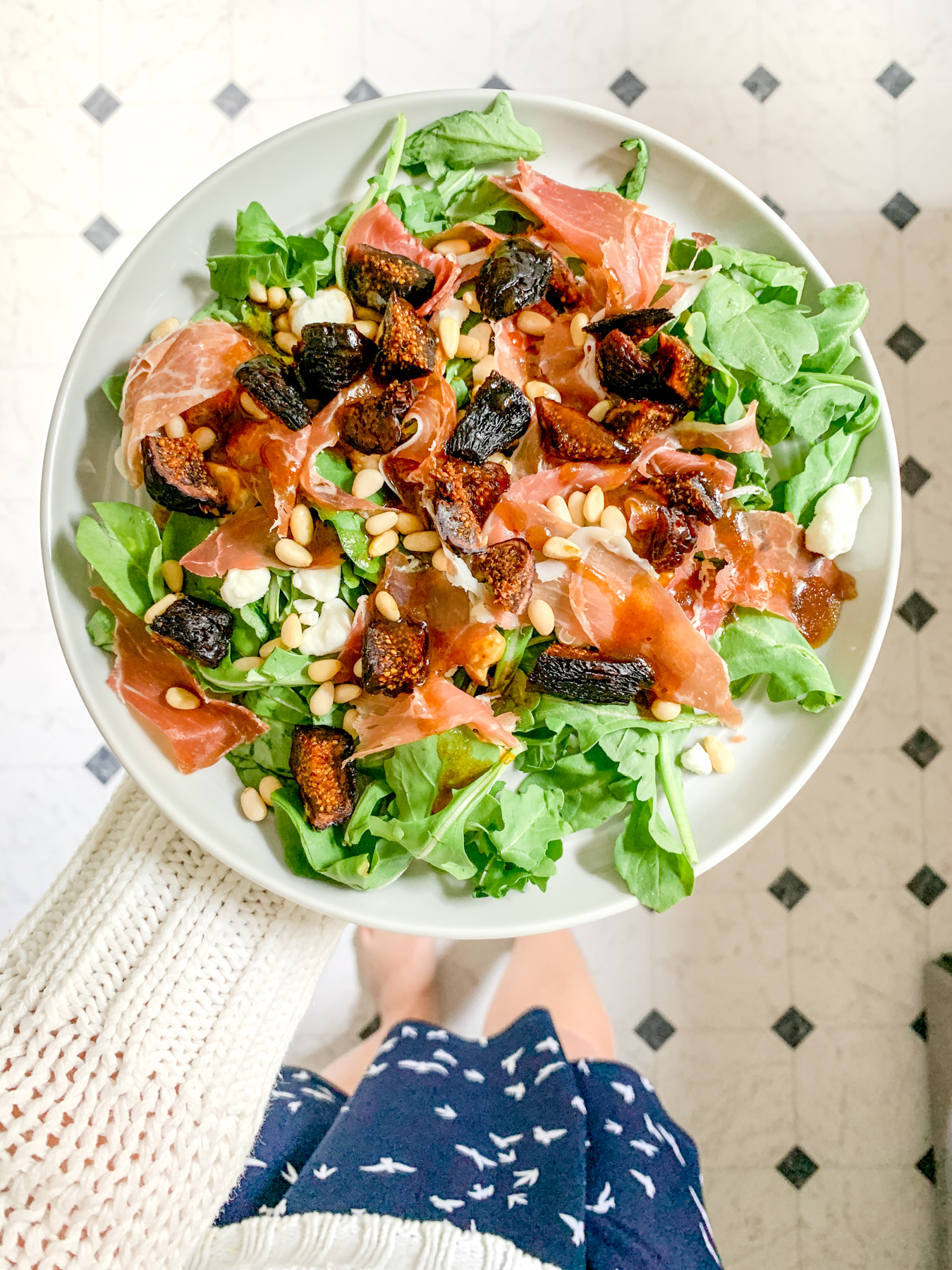 fig prosciutto salad on a plate