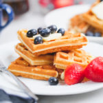 old fashioned waffles with berries on a breakfast table
