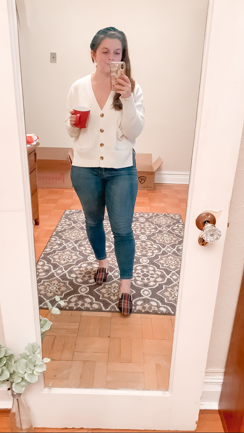 white sweater and jeans outfit while working from home