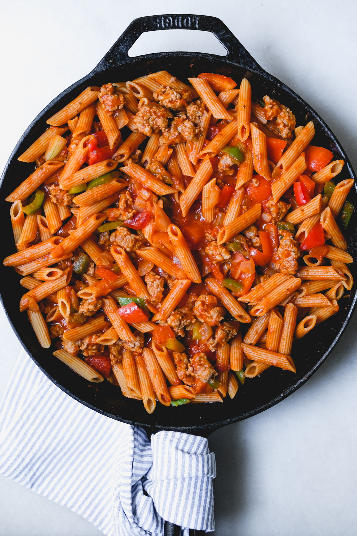 sausage and pepper pasta in a skillet