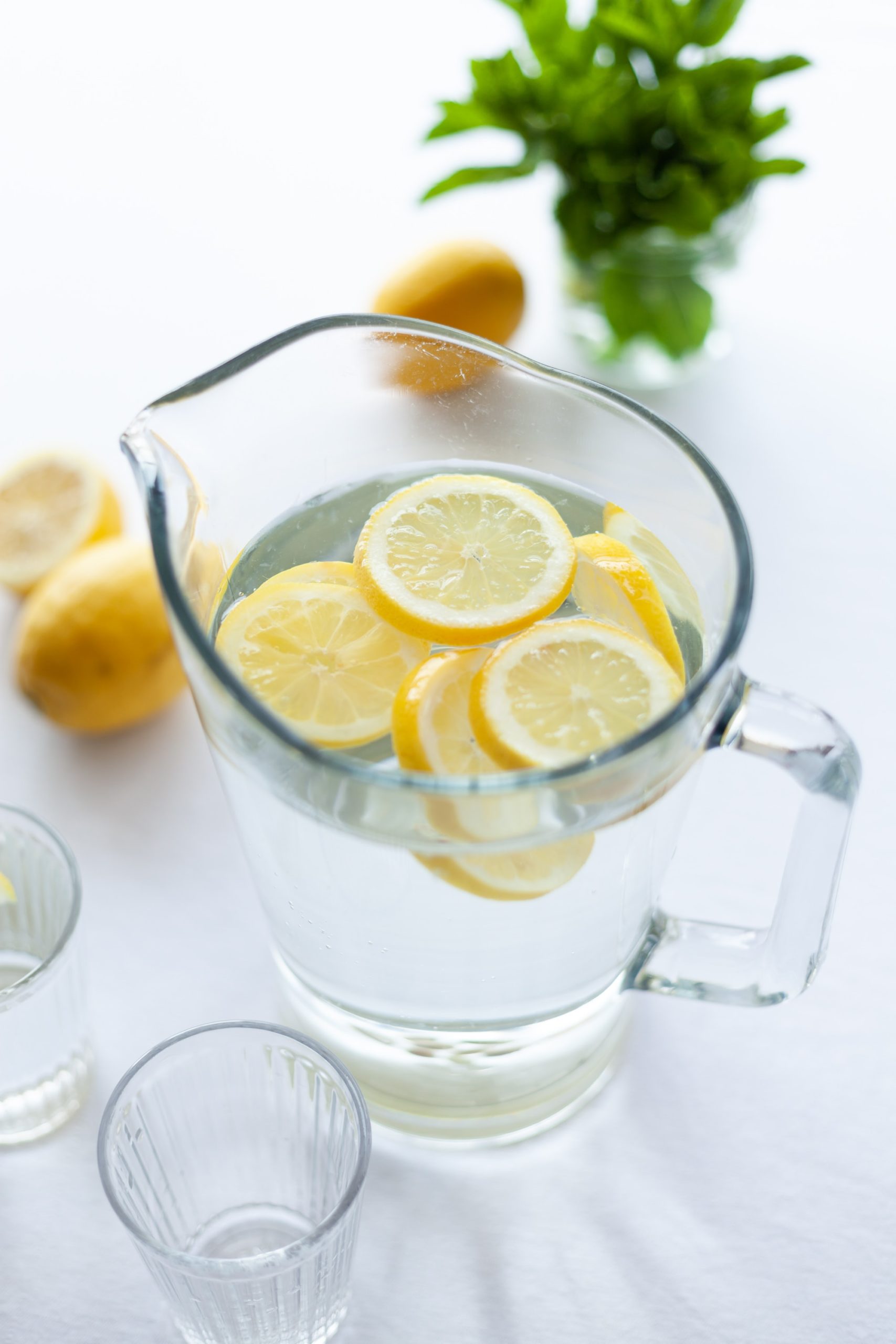 water with lemon in a pitcher