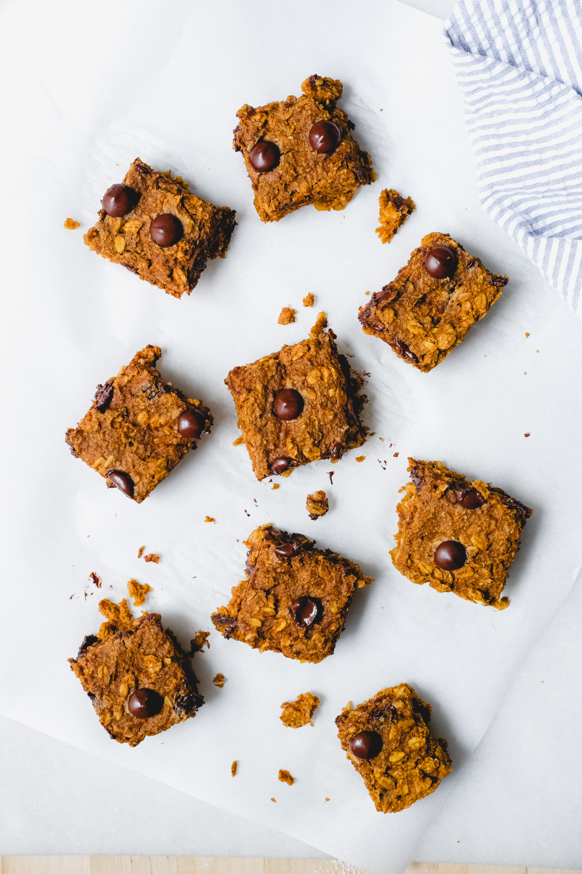 pumpkin chocolate chip oat bars on a white table