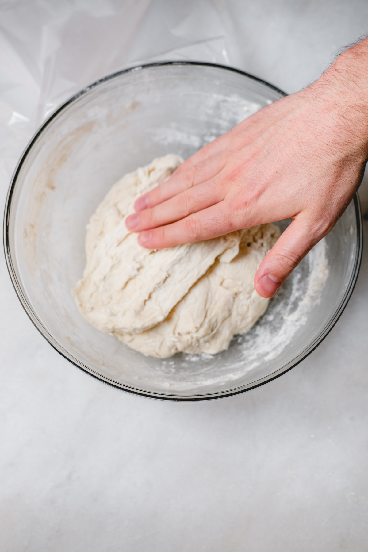 folding sourdough bread dough on top